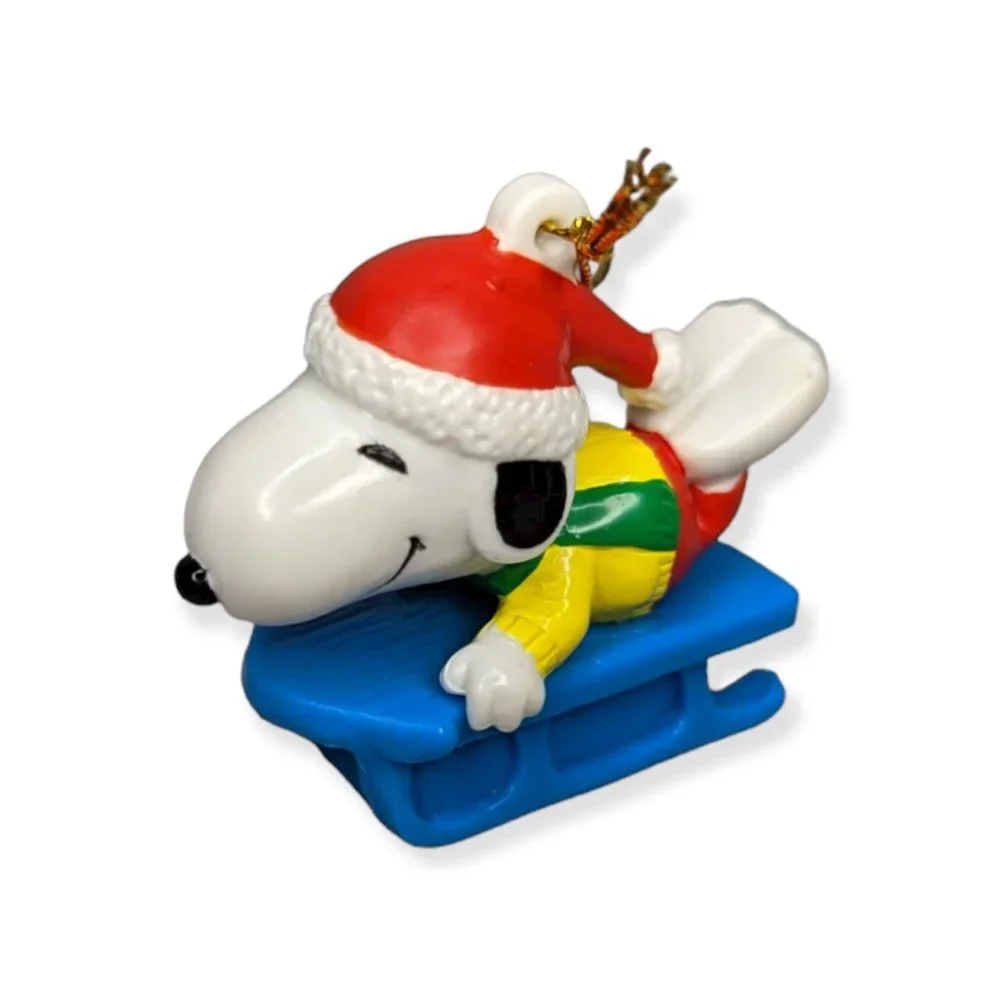 Vintage Peanuts Sledding Snoopy United Feature Syndicate Inc PVC Ornament